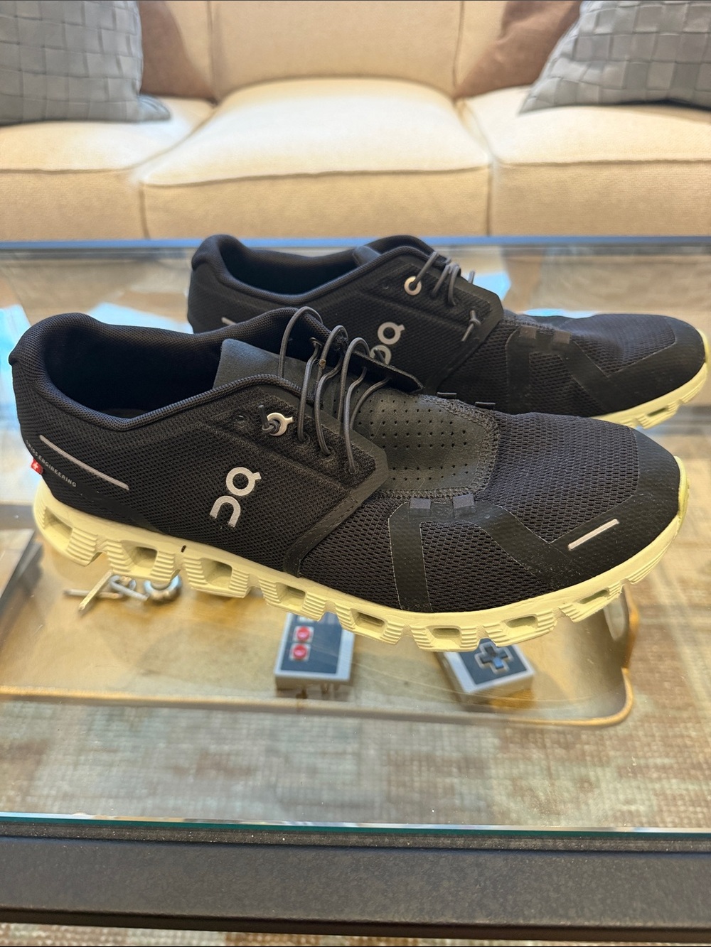 On Running Men's Cloud Shoes in Black with creamy green Sole